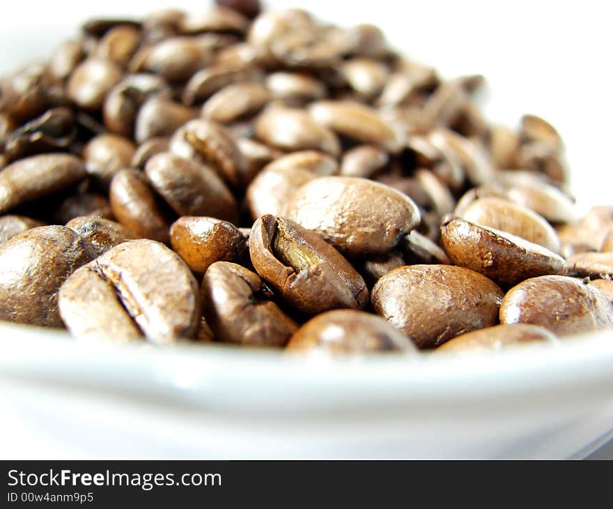 Natural black coffee beans closeup