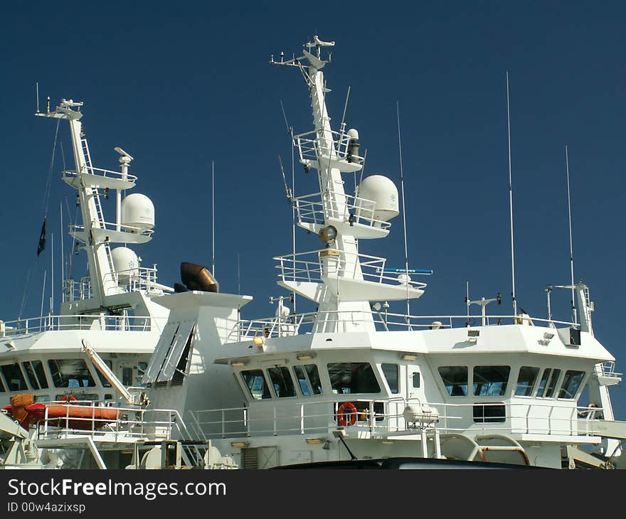 White boats against blue sky