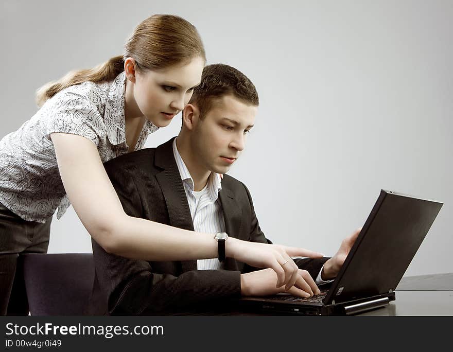 Young man and woman working together