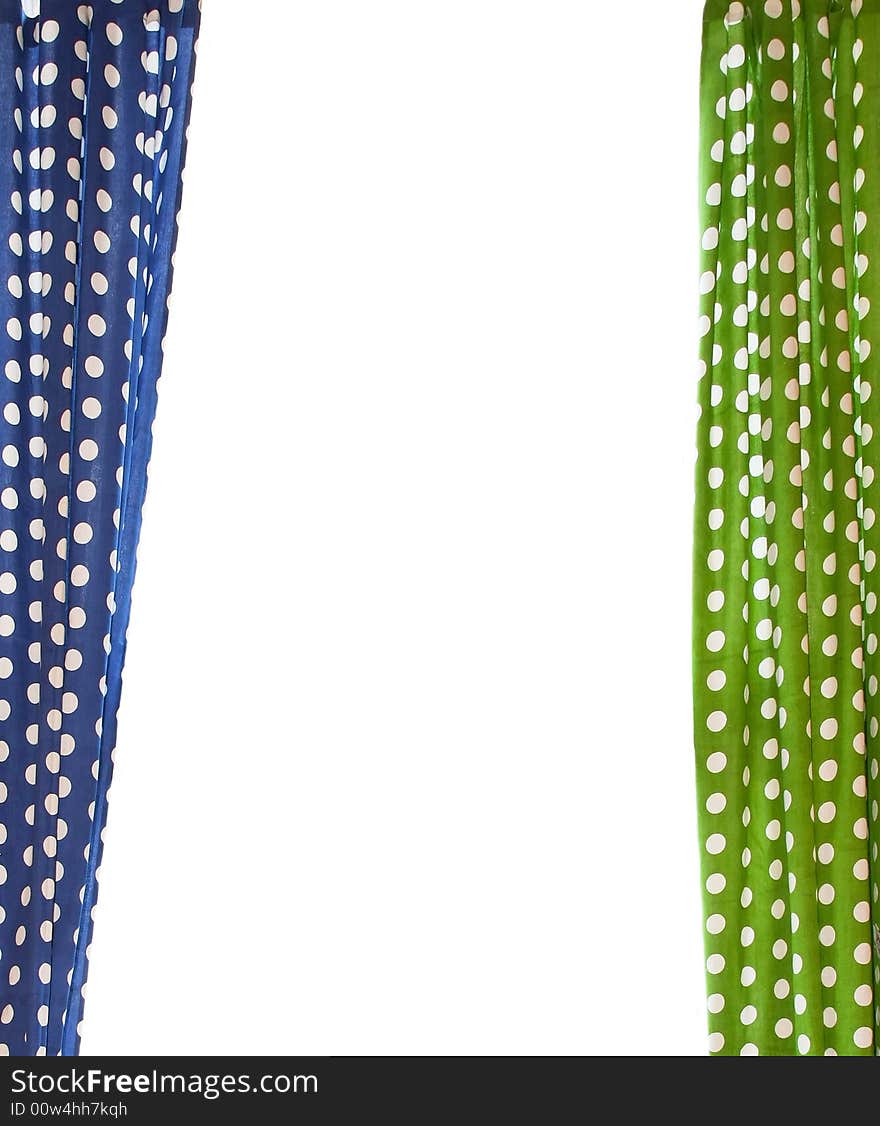 Two curtains with dots isolated over window