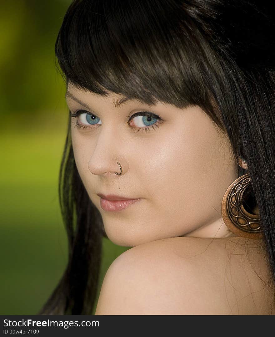 A portrait of a lovely young lady outdoors