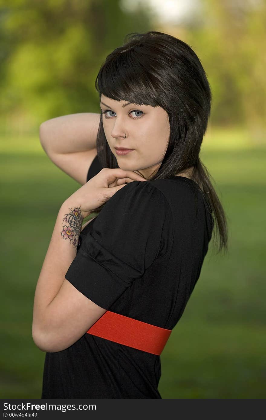 A portrait of a lovely young lady outdoors