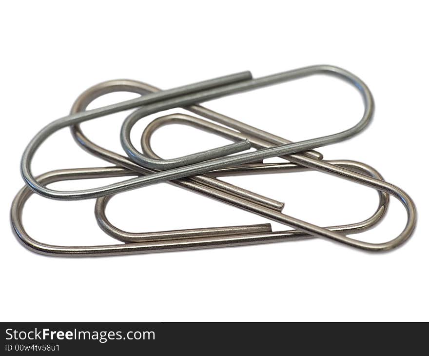 Close up paper clip isolated on white