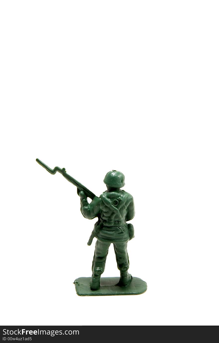 Green army man with rifle and bayonet on a white isolated background.