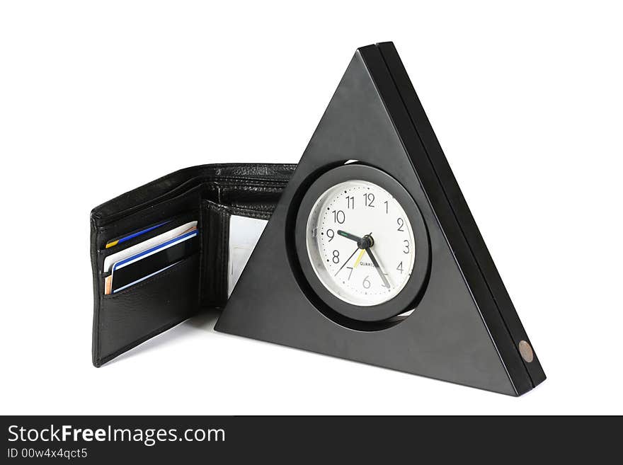 The triangular clock and purse on a white background