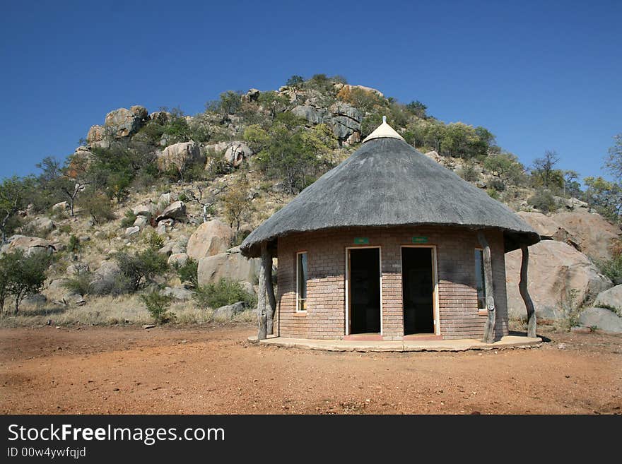 African Hut at the foot of a granite hill in South Africa. African Hut at the foot of a granite hill in South Africa.