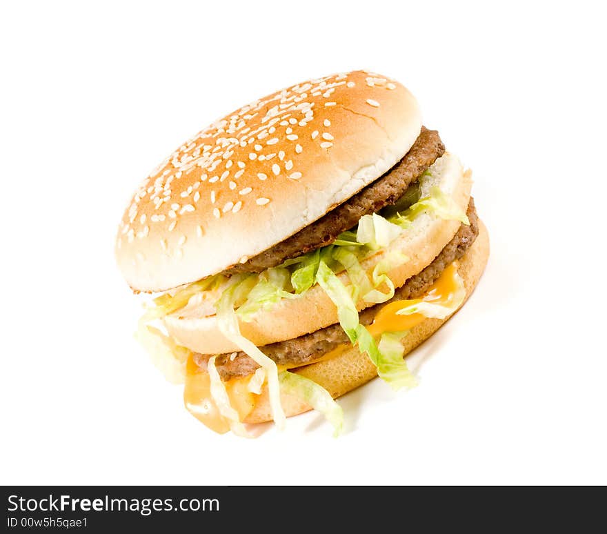 Bread with fried meat, cheese, onion and lettuce isolated on a white background. Bread with fried meat, cheese, onion and lettuce isolated on a white background.