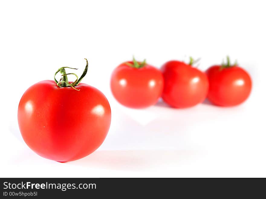 Fresh red tomatoes isolated on white background. Fresh red tomatoes isolated on white background