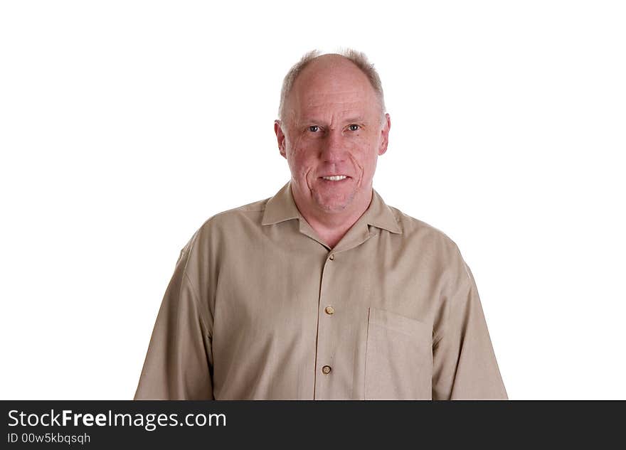 An older guy in a brown shirt smiling and happy. An older guy in a brown shirt smiling and happy