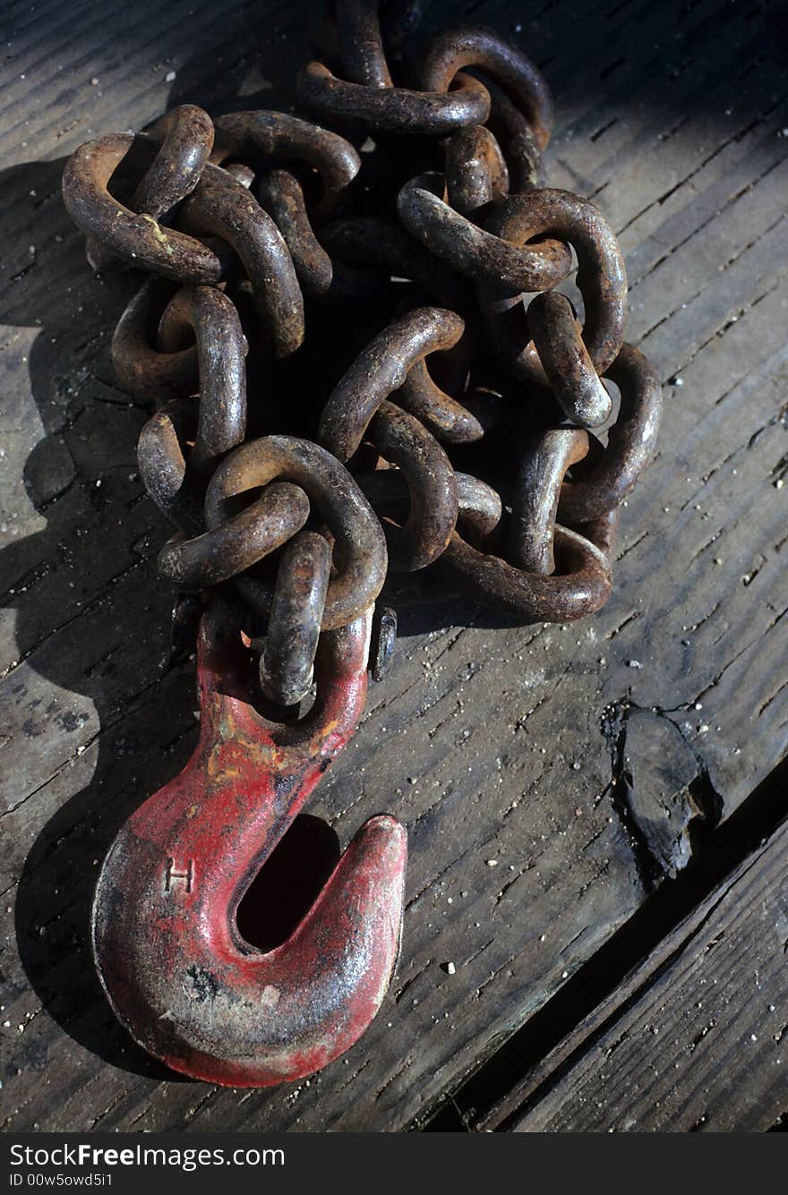 A tow chain sitting on the floor. A tow chain sitting on the floor