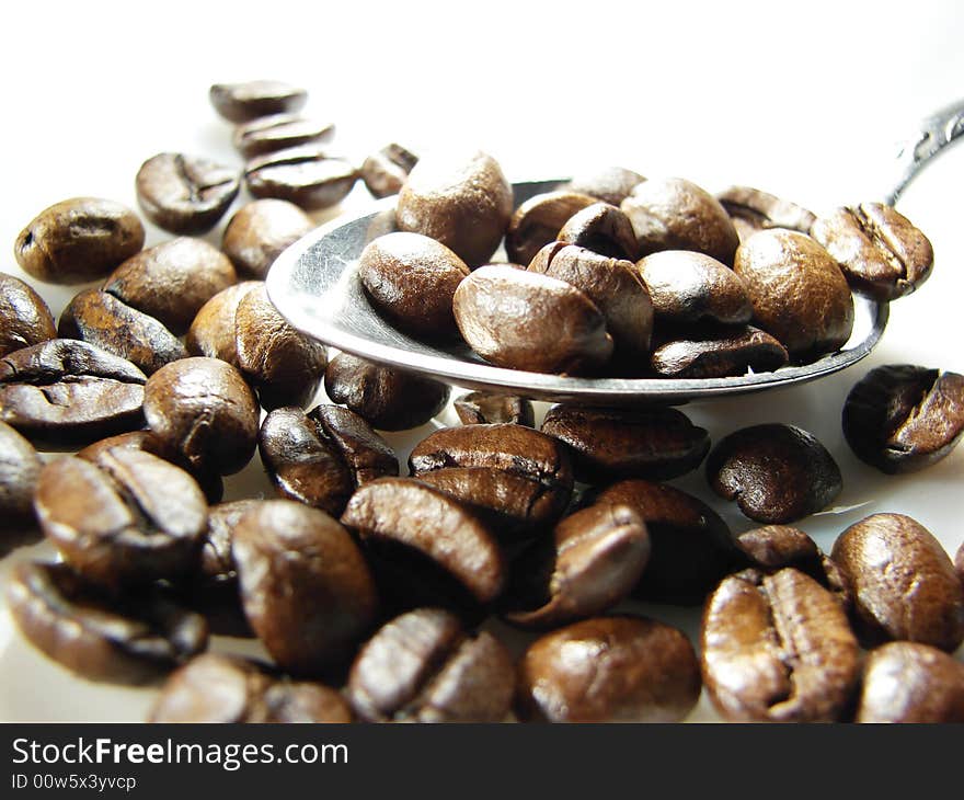 Natural coffee beans with spoon 2