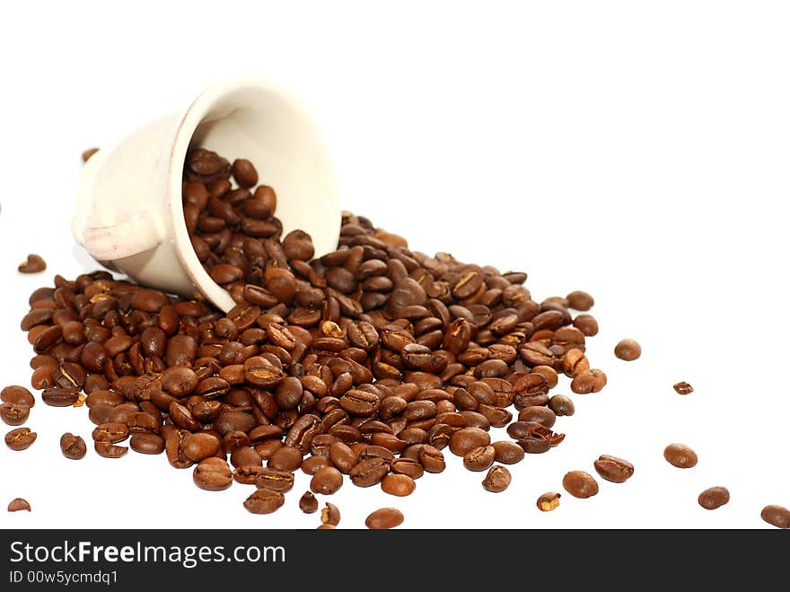 Coffee cup with roasted beans