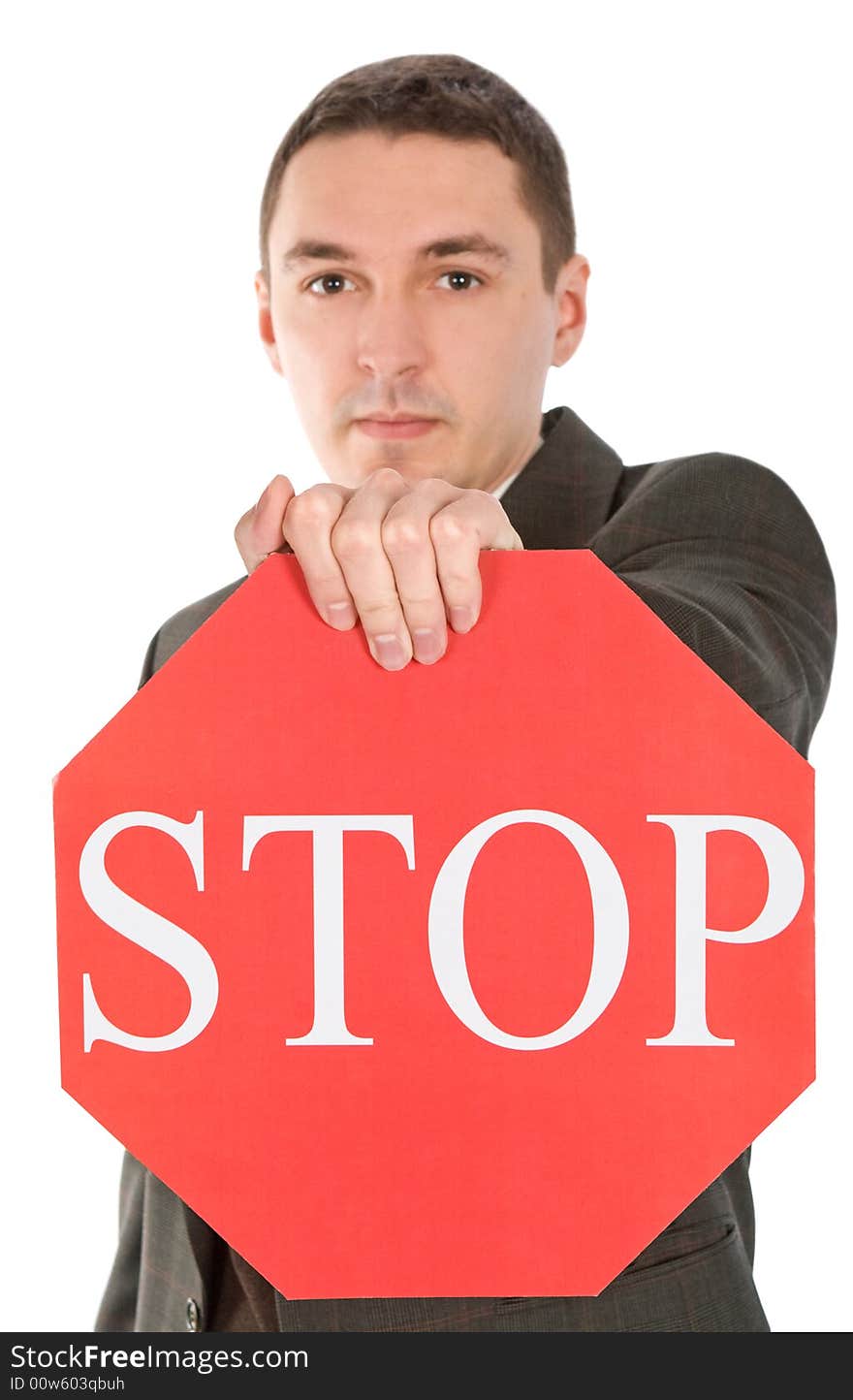 Holding stop sign over white background