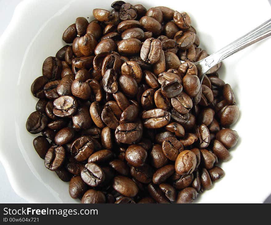 Natural coffee beans and spoon 3