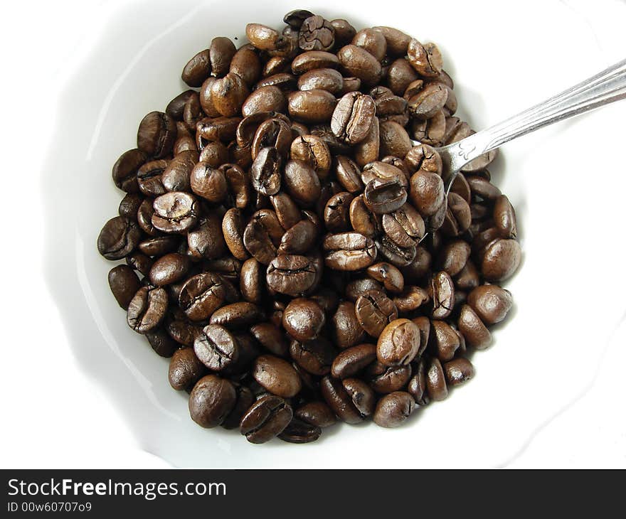 Natural coffee beans and spoon 2