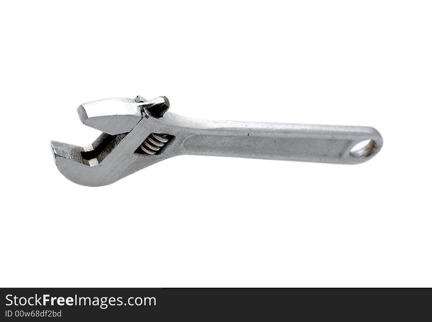 Metal wrench on white background