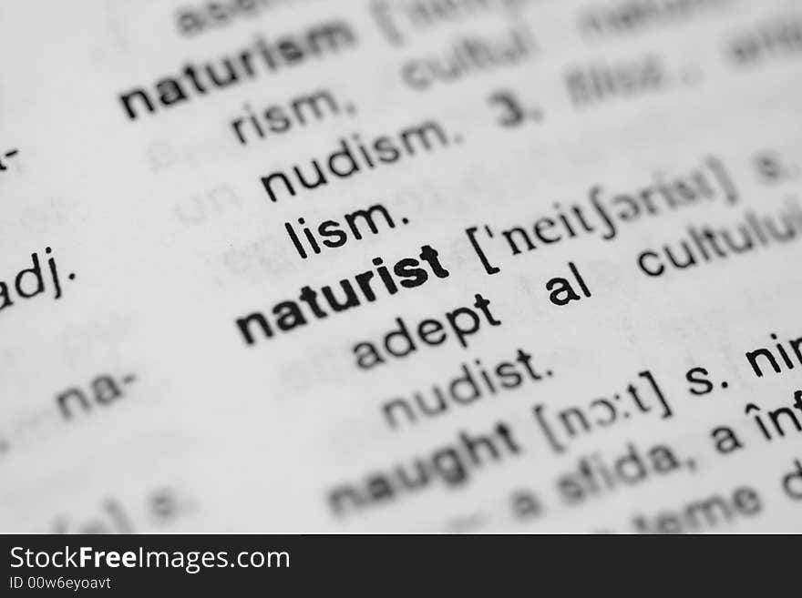 Close-up of the word naturist in a dictionary.