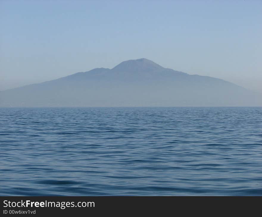 Mount Vesuvius floating in a haze over Naples