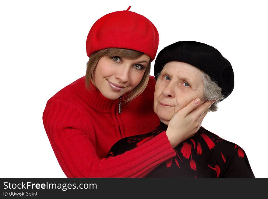 Happy grandmother and granddaughter with berets