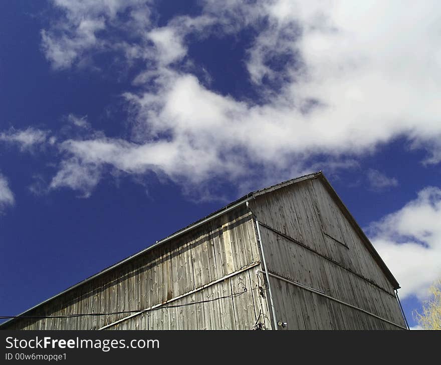 Barn on blue sky