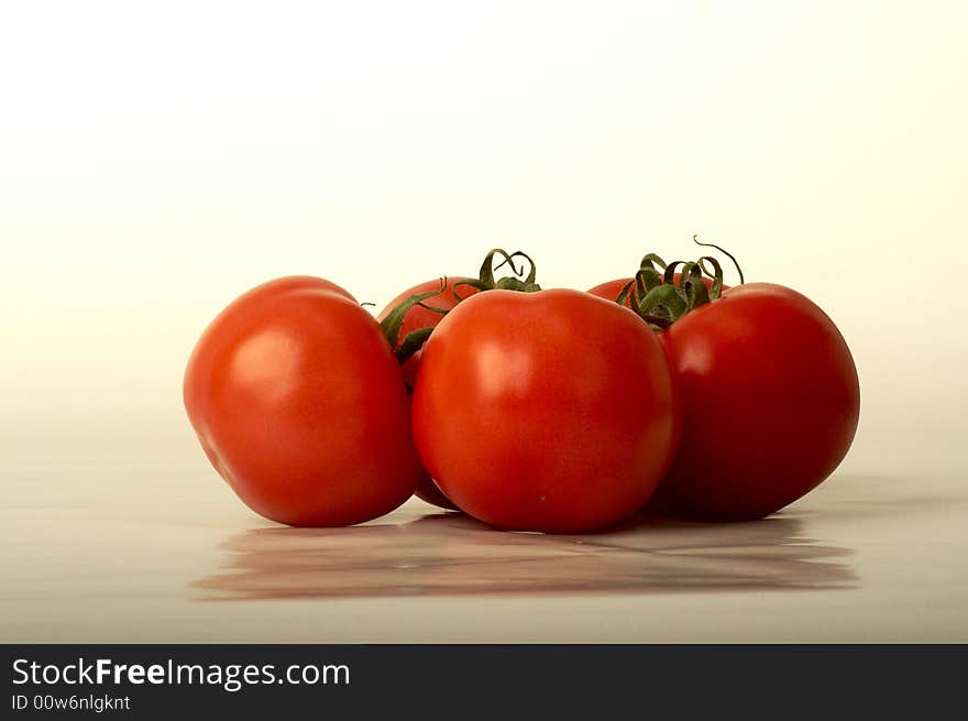 Group of tomatoes in white background