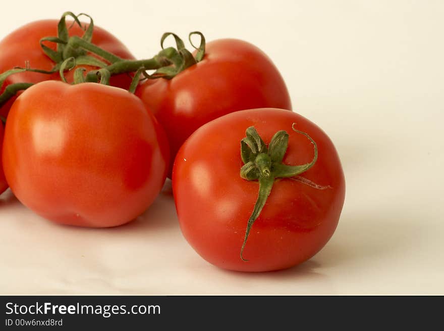 One tomatoe out of the group. One tomatoe out of the group