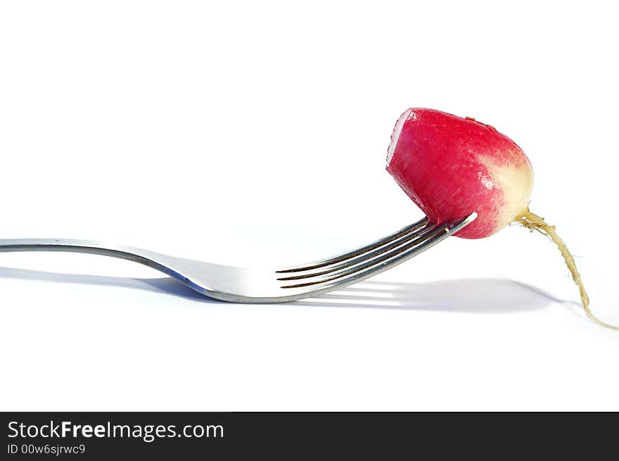 Fork and radish isolated on white background