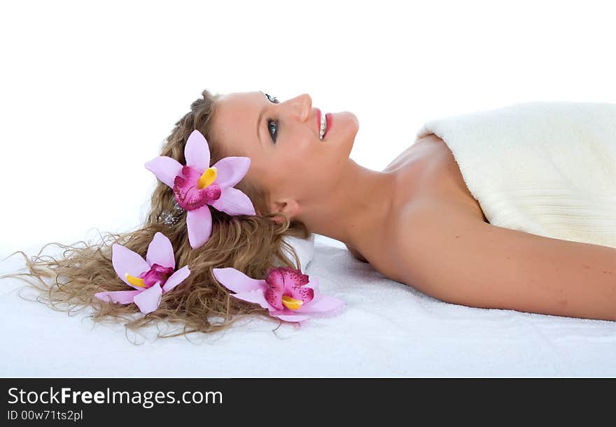 Attractive woman getting spa treatment on white