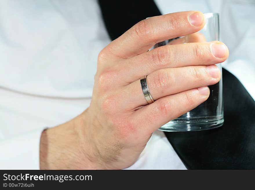 Glass with water in hand