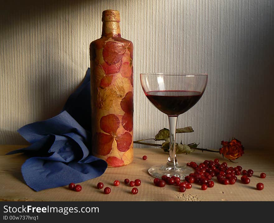 Still-life with red drink and cranberries