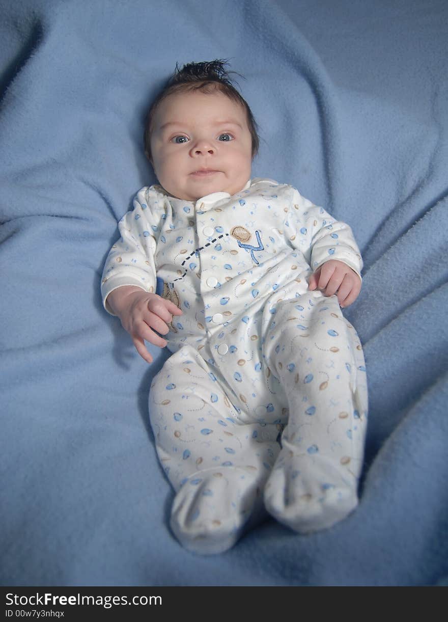 Infant on a blue background. Infant on a blue background