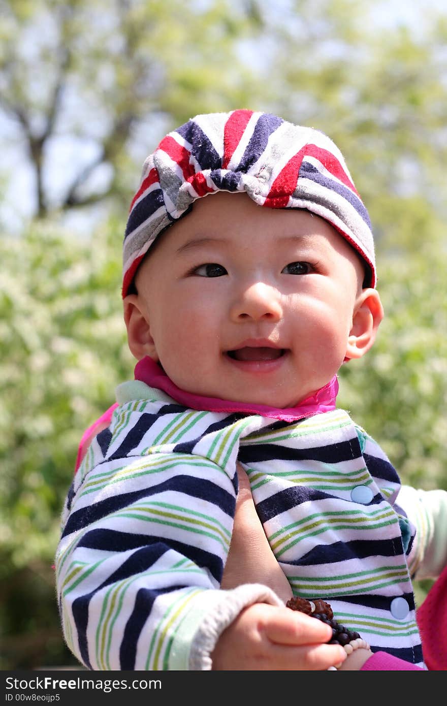 Smile baby boy in the afternoon.