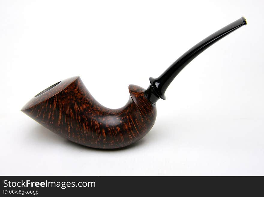 An tobacco pipe on white background.