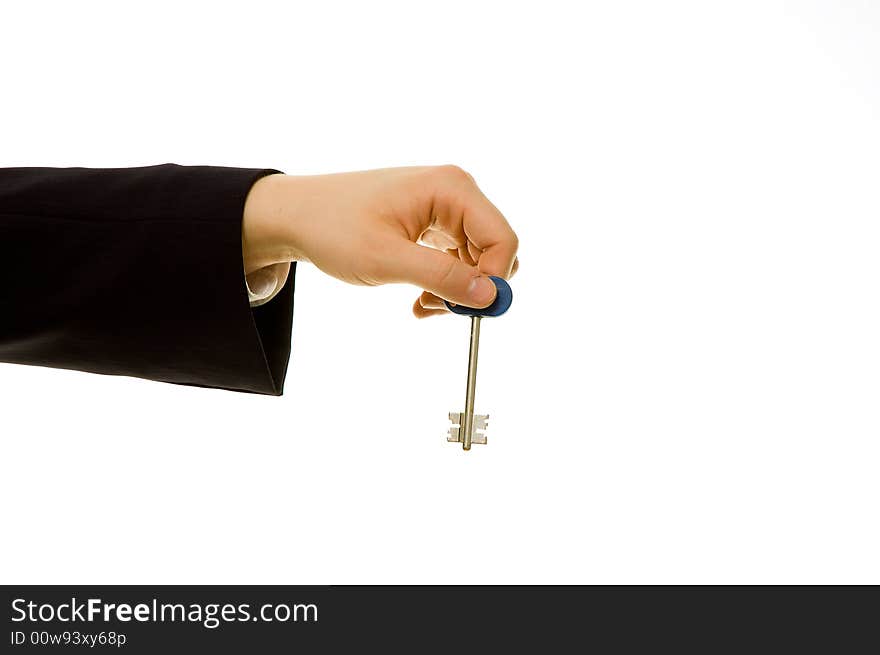 Businessman holding a key (to success)