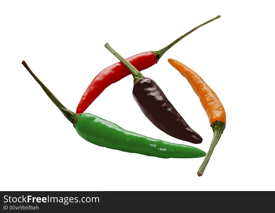 Three isolated hot peppers on white. Three isolated hot peppers on white