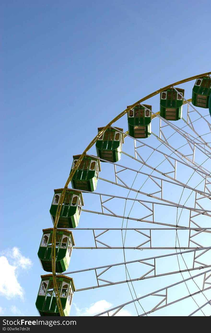 Giant Wheel detail isolated in blue sky background - in counter light -