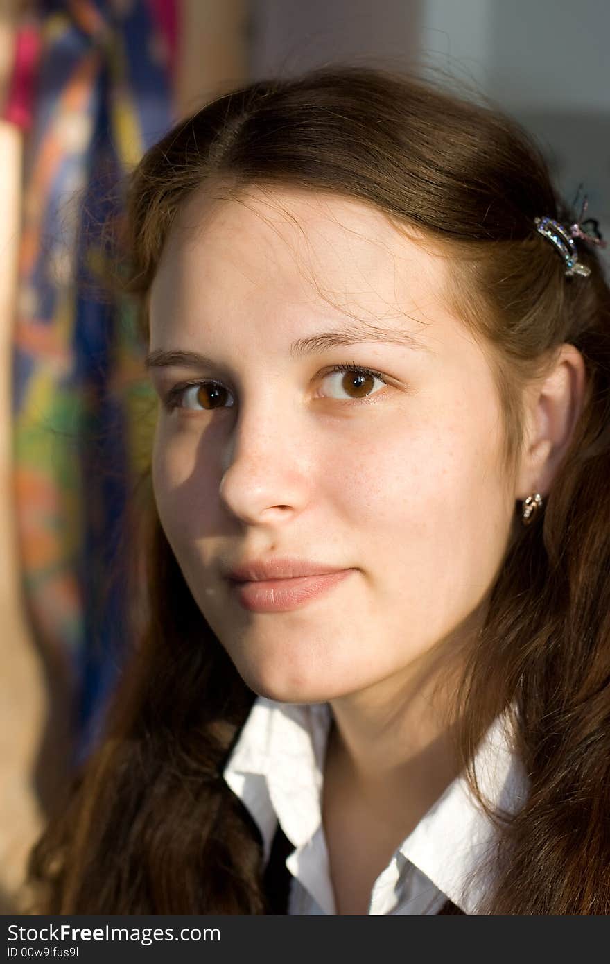 Portrait of young woman looking into cam. Portrait of young woman looking into cam