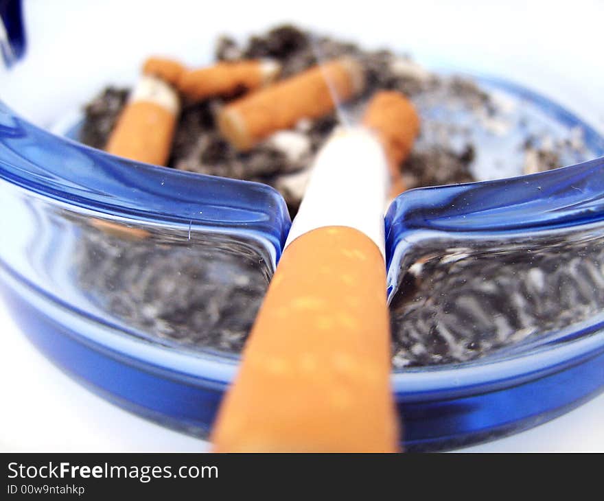 Cigarette on white background. Clear.