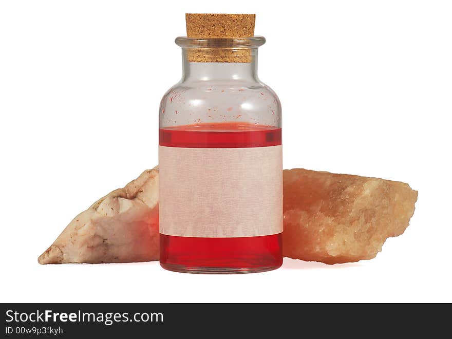 Red Liquid in Bottle with Blank Label and Two Stones - isolated on white background