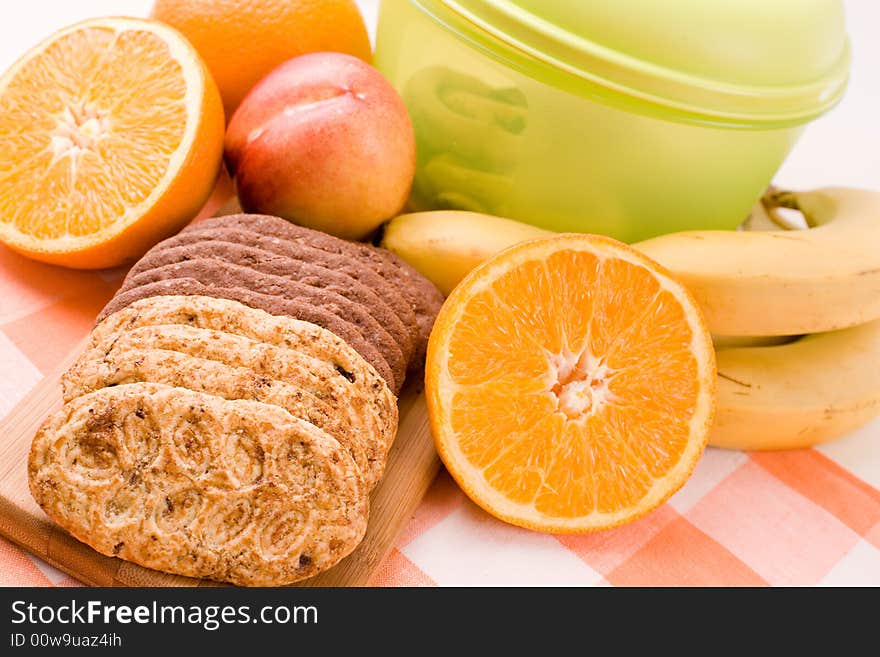 Fruits and delicious cookies - time for break. Fruits and delicious cookies - time for break