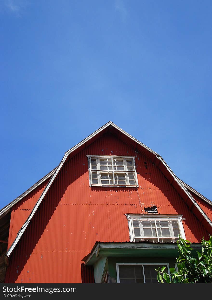 A very old house and beautiful blue sky