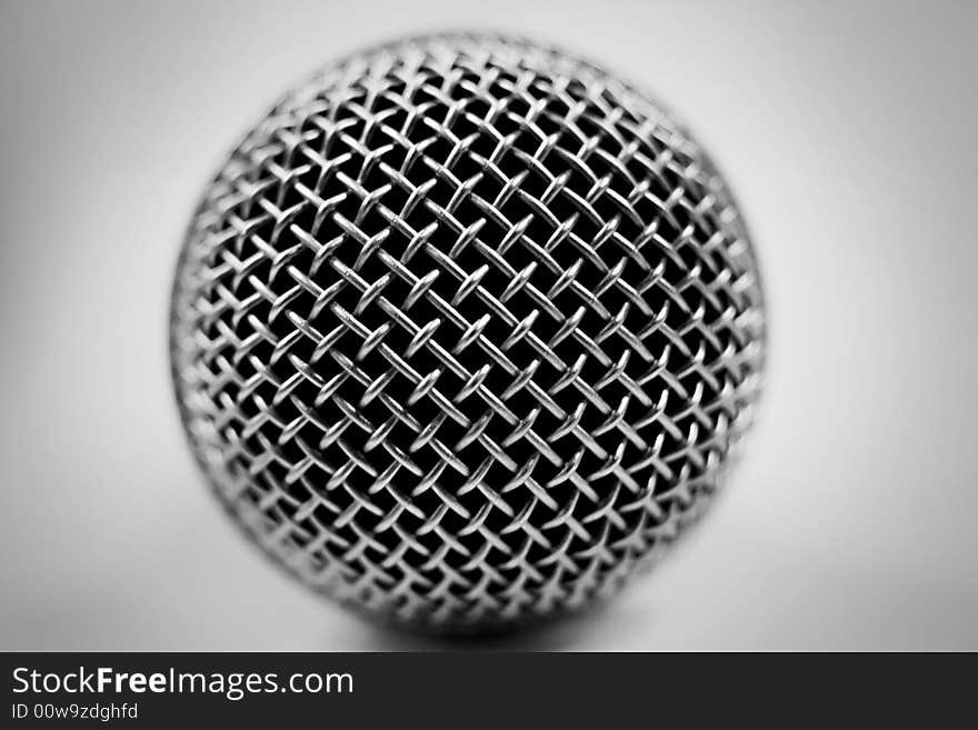 Photo of a microphone on a white background