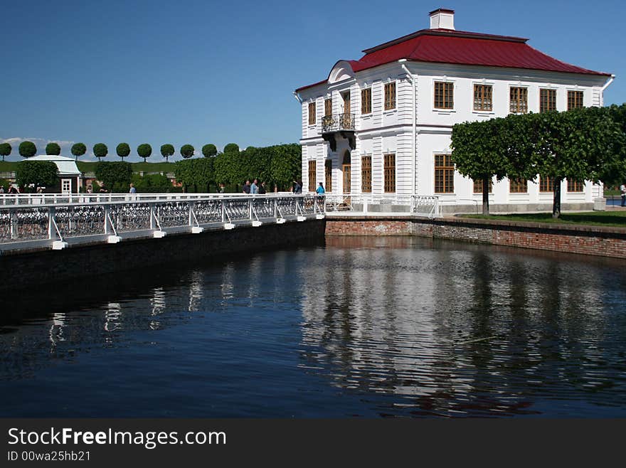 White building and the bridge to it. Russia. Peterhof. White building and the bridge to it. Russia. Peterhof