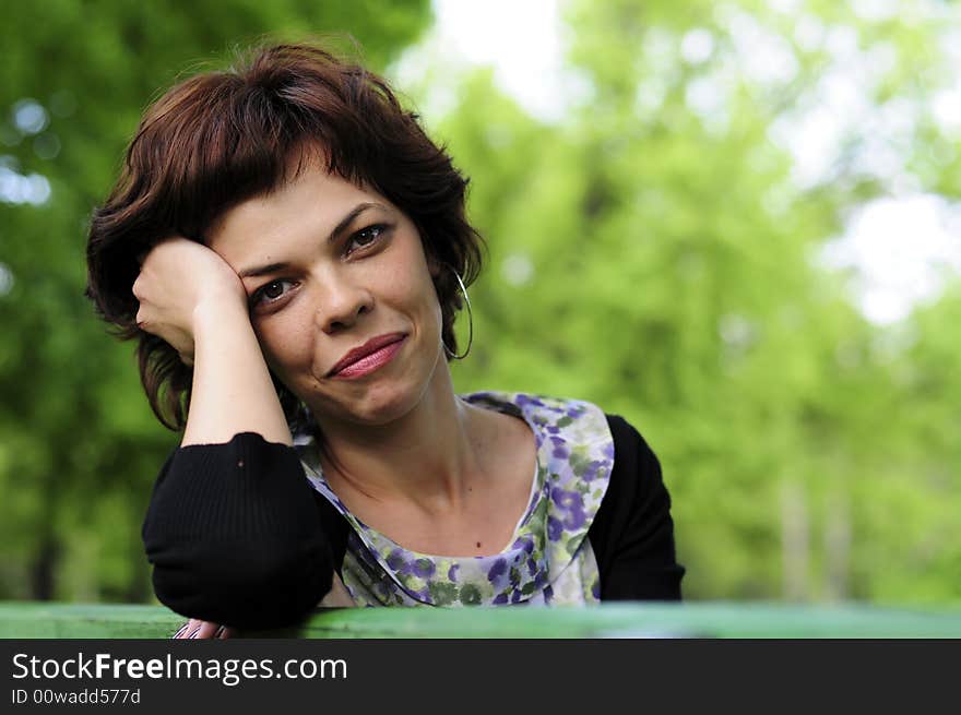 Young woman in a public park. Young woman in a public park