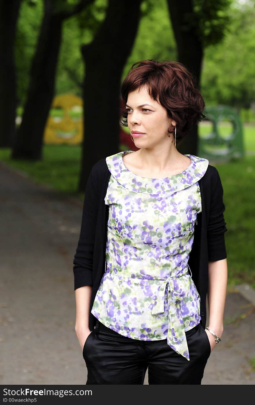 Young woman in a public park. Young woman in a public park