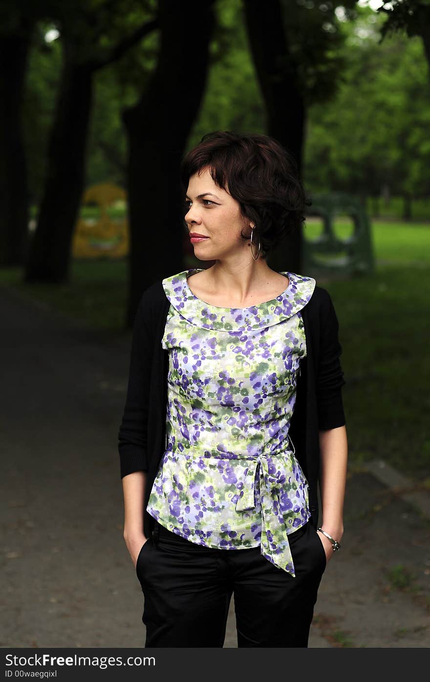 Young woman in a public park. Young woman in a public park