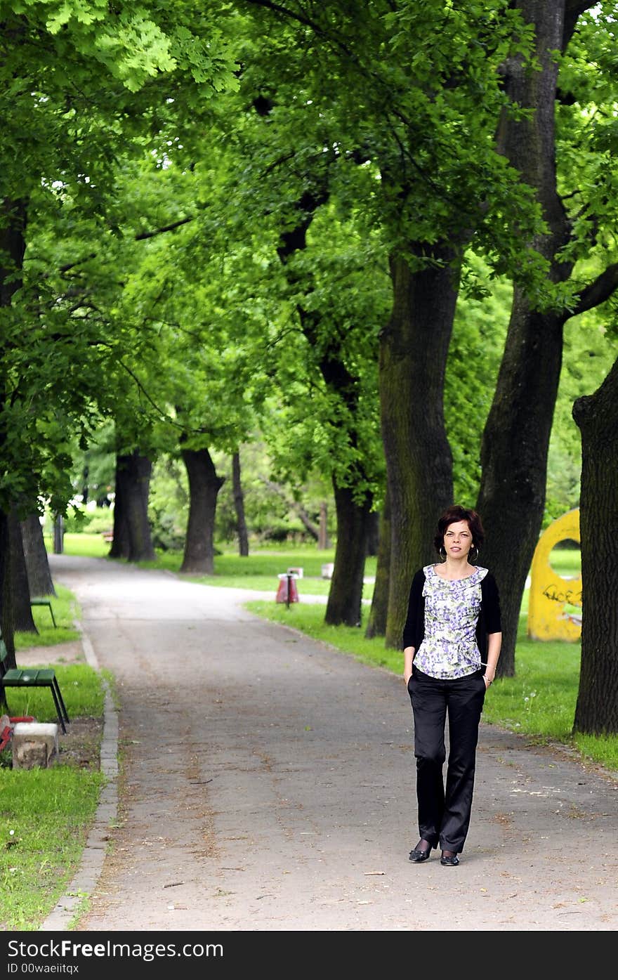 Young woman in a public park. Young woman in a public park