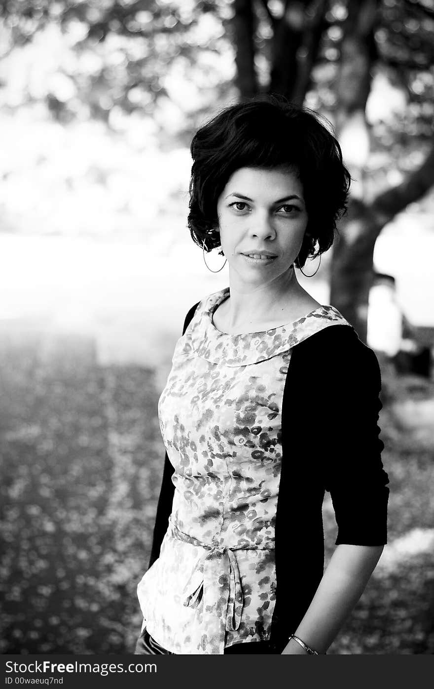 Young woman in a public park. Young woman in a public park