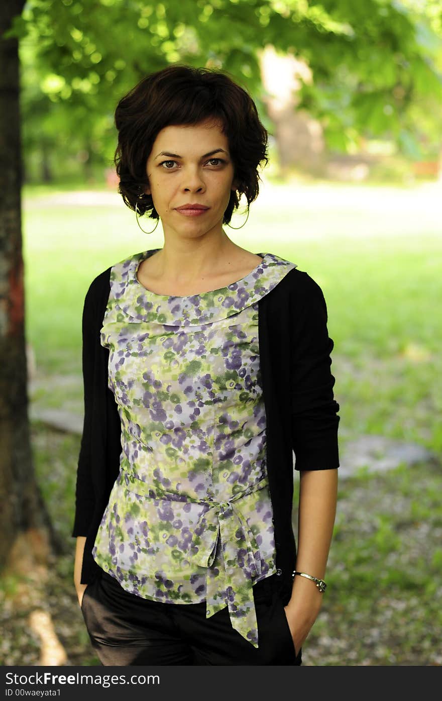 Young woman in a public park. Young woman in a public park