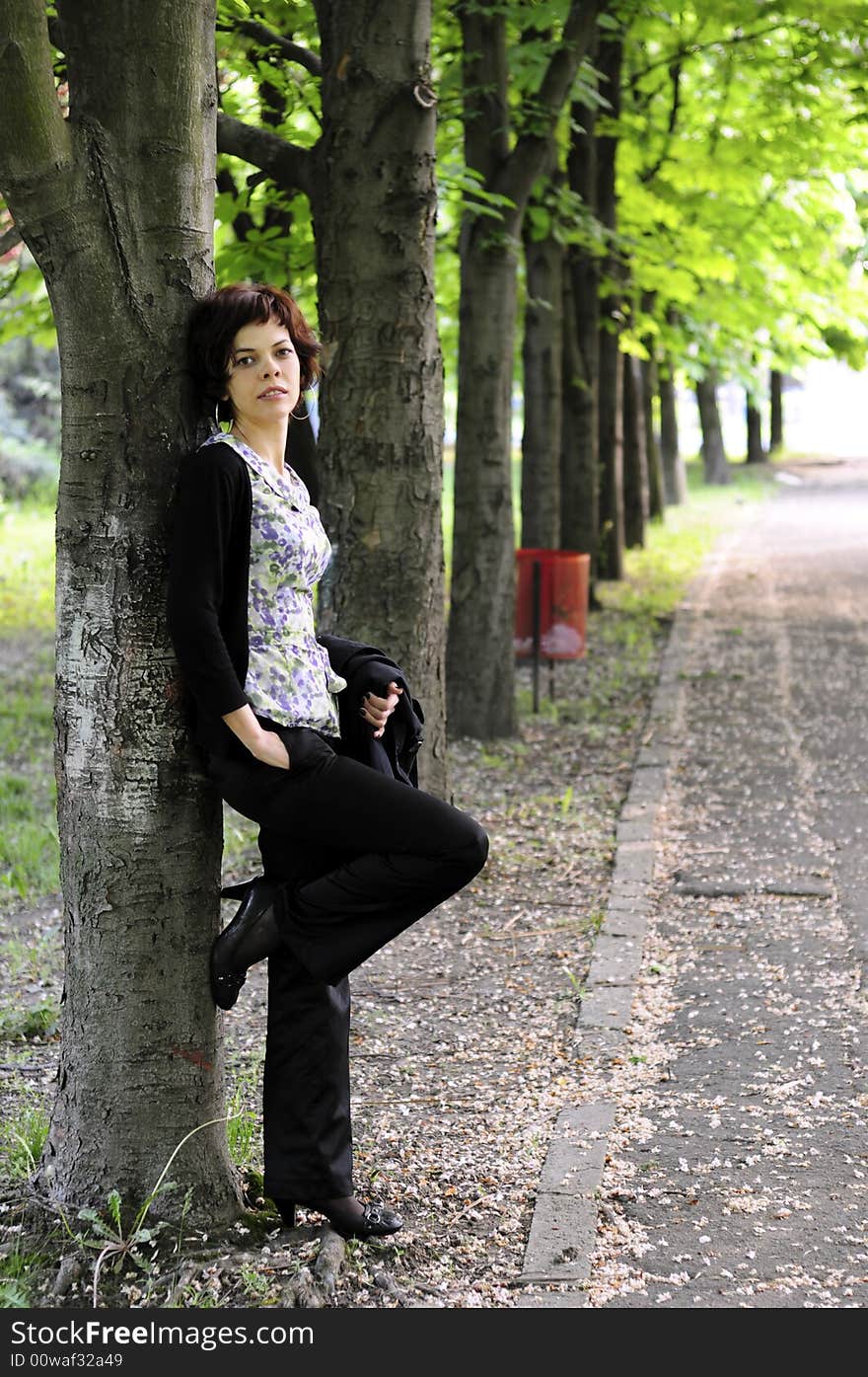 Young woman in a public park. Young woman in a public park